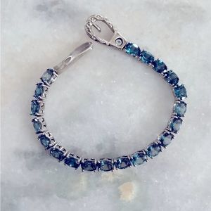 Beautiful blue topaz tennis bracelet.